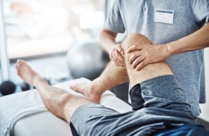 Closeup shot of an unrecognizable physiotherapist treating a patient